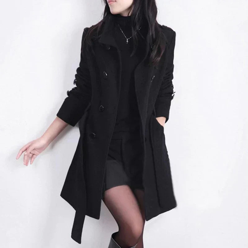 Women's classic double-breasted trench coat with belted waist, perfect for elegant outerwear and fall fashion.
