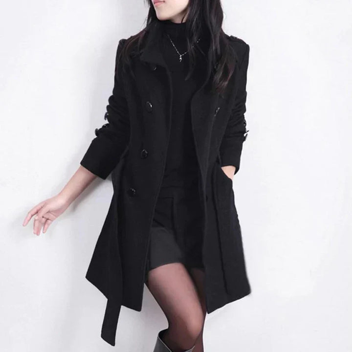 Women's classic double-breasted trench coat with belted waist, perfect for elegant outerwear and fall fashion.