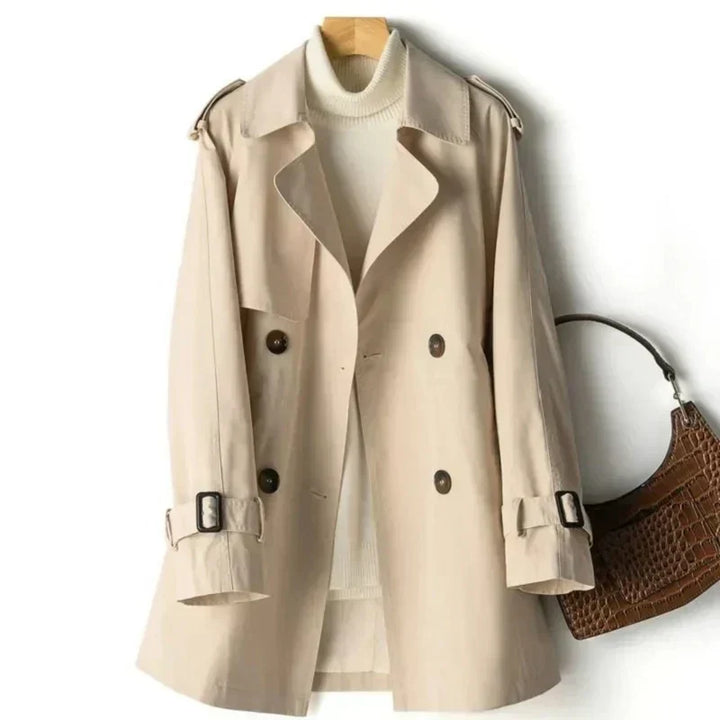 Women's classic double-breasted trench coat with belt & adjustable cuffs, ideal for office & formal wear.