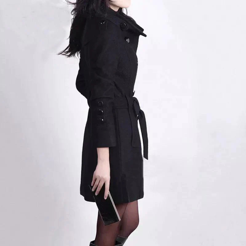 Stylish women's double-breasted trench coat, ideal for a sophisticated business casual look or daily wear.