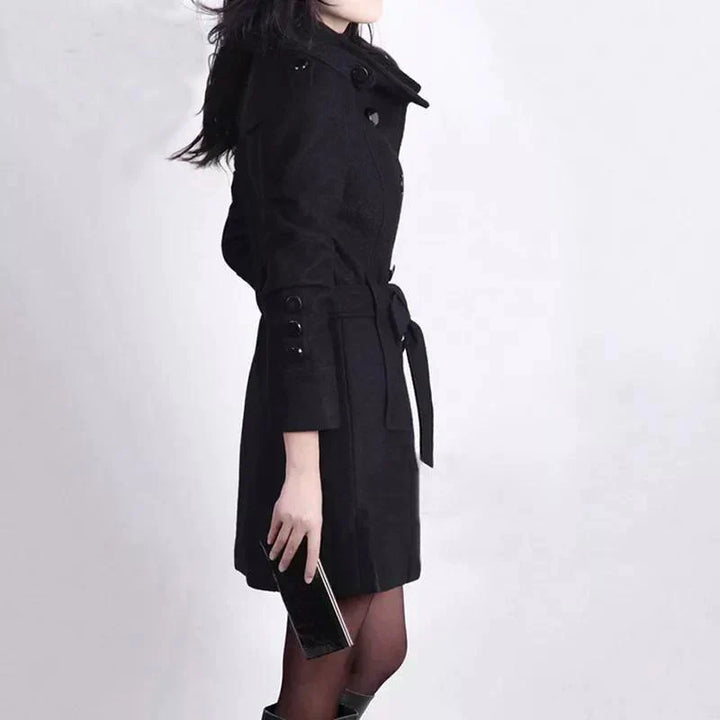 Stylish women's double-breasted trench coat, ideal for a sophisticated business casual look or daily wear.
