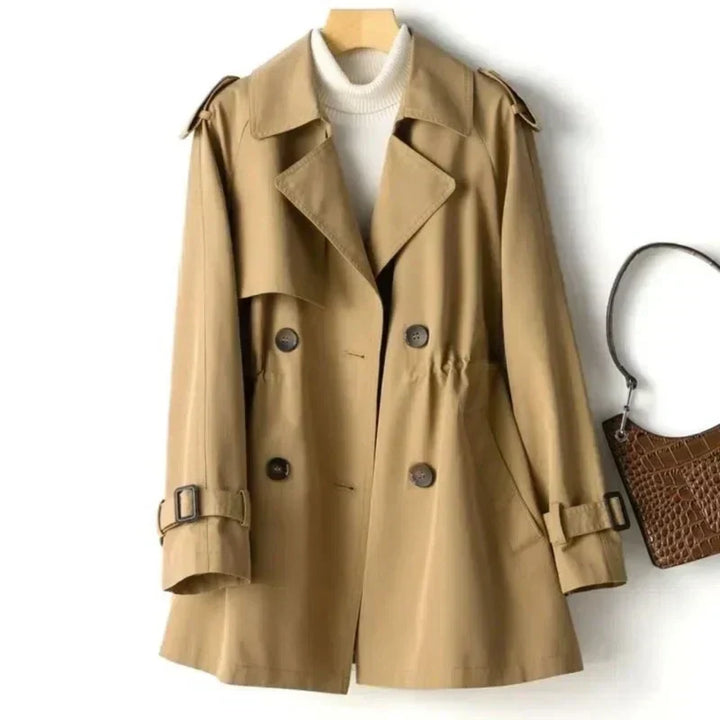 Elegant women's long belted trench coat, double-breasted outerwear. Perfect for office & versatile styling.