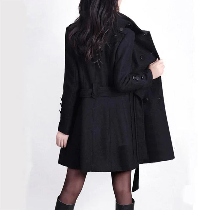 Elegant women's trench coat, double-breasted with belted waist, a chic choice for fall fashion and winter outerwear.