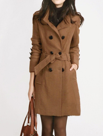 Classic women's double-breasted trench coat featuring a flattering belted waist for a timeless and elegant silhouette.