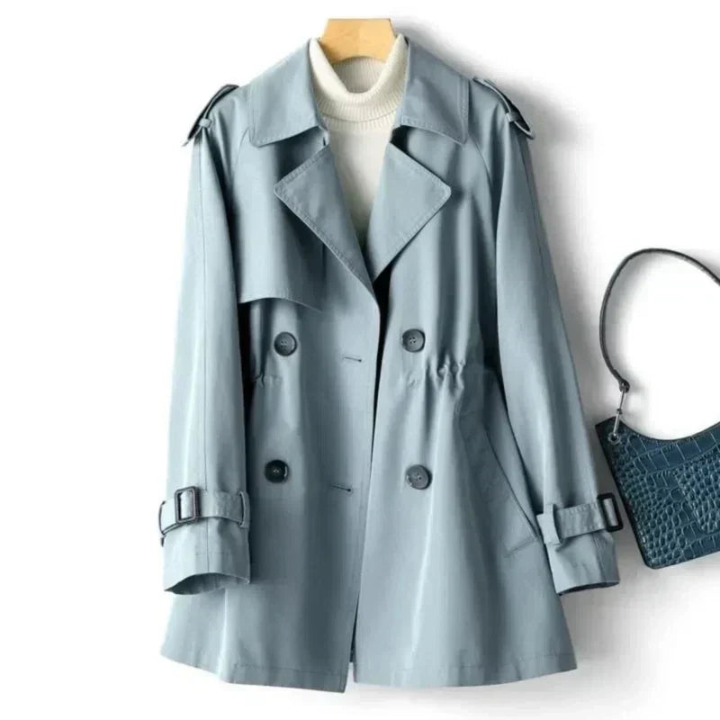 Stylish women's double-breasted trench coat with adjustable belt & cuffs. Comfortable classic office outerwear.