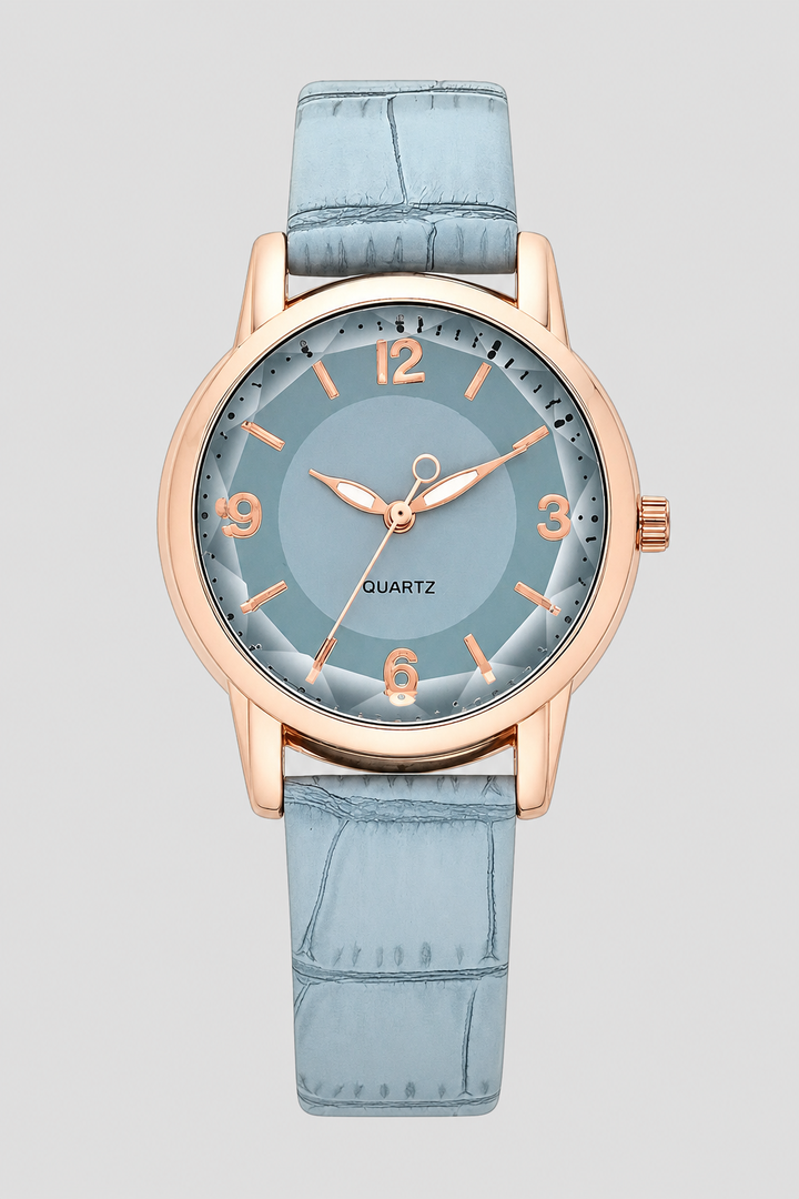 Women's fashion watch with an elegant minimalist face and a textured embossed strap, a chic accessory.
