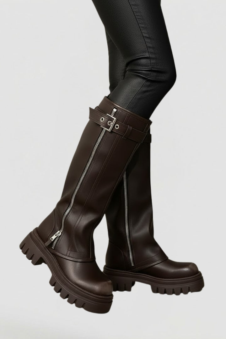 Tall women's knee-high platform boots featuring a round toe & side zipper, offering elevated style for winter fashion.