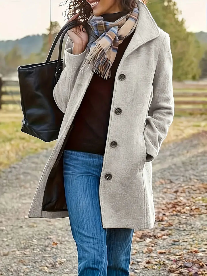 Women's classic lapel button-front trench coat for elegant layering. Perfect for fall & winter outerwear.