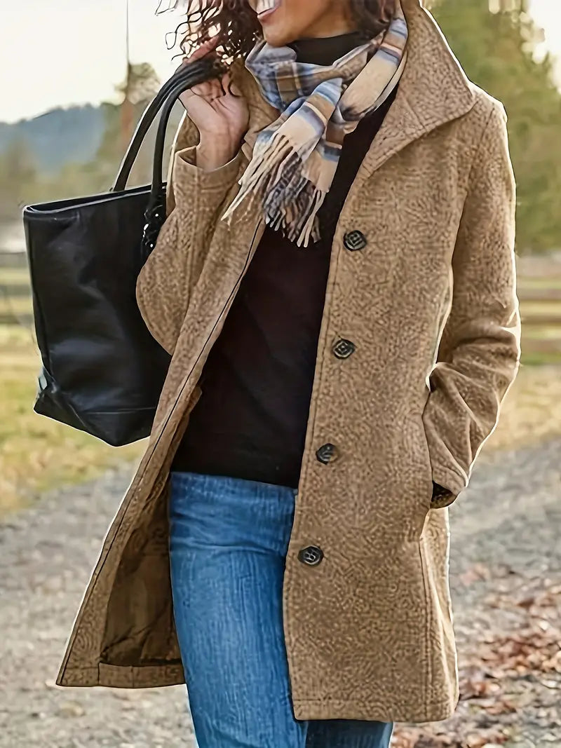 Elegant women's button-front trench coat. Timeless lapel design, ideal for fall & winter layering.
