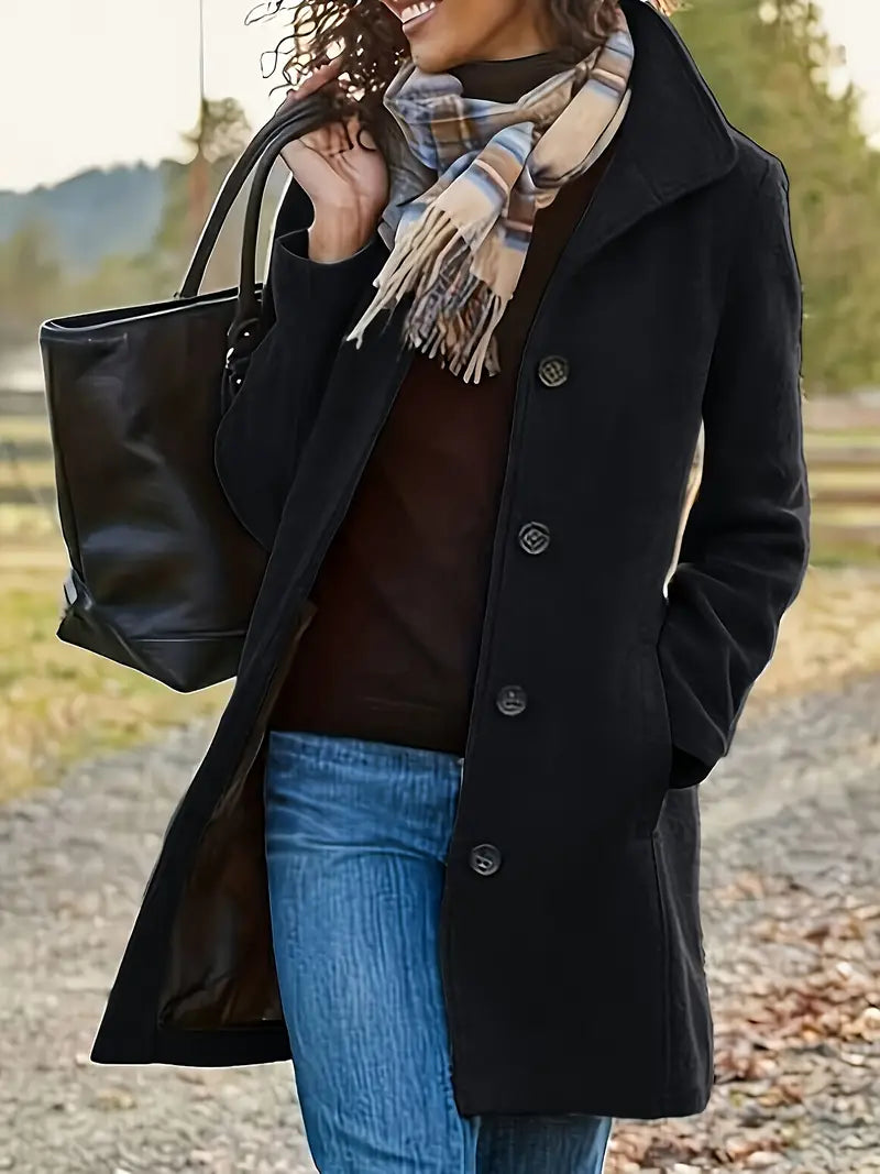 Versatile women's mid-length trench coat. Elegant button-front, lapel design. Essential fall/winter outerwear.