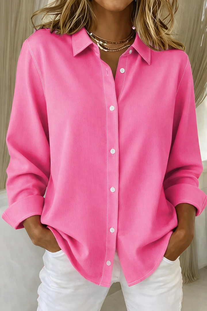 Women's classic long sleeve button-up shirt in a versatile solid color, perfect for effortless everyday style.