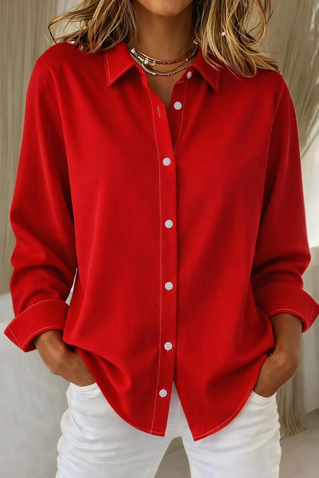 Elegant women's solid color long sleeve button-up shirt, a classic style staple for any wardrobe.