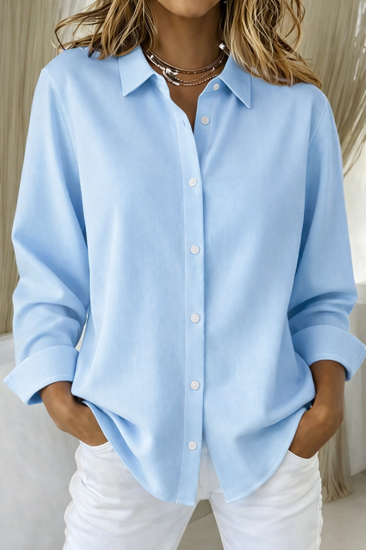 Effortless classic style with this women's long sleeve button-up shirt, perfect for versatile wear.