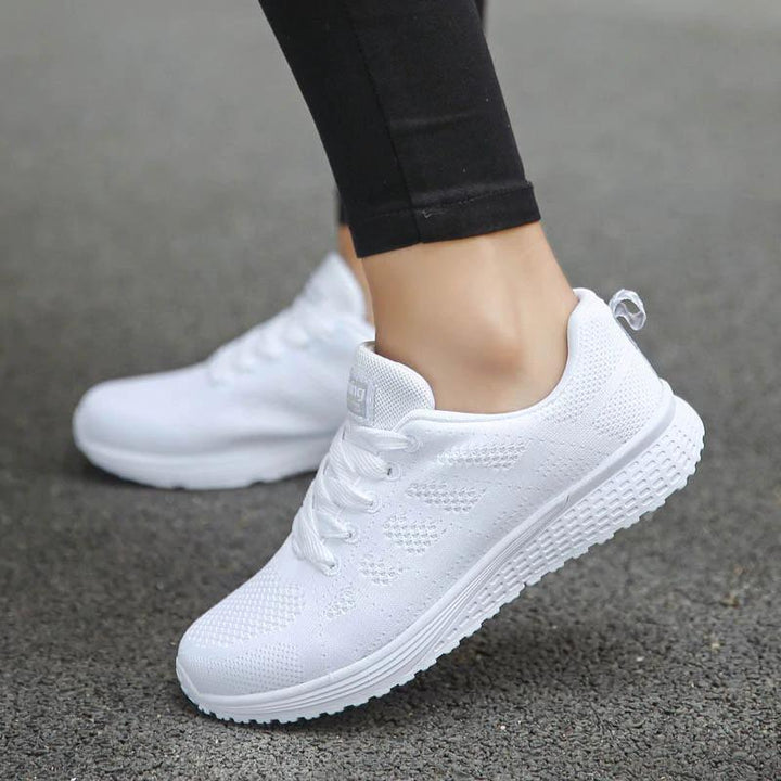 Lightweight women's walking shoes with orthopedic arch support for long-lasting comfort.
