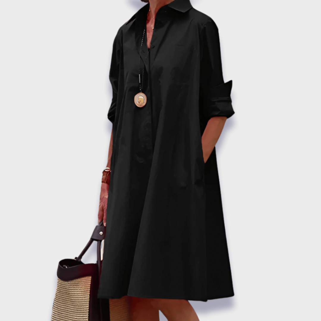 Versatile black women's midi polo dress with classic collar, perfect for comfortable summer and casual style.