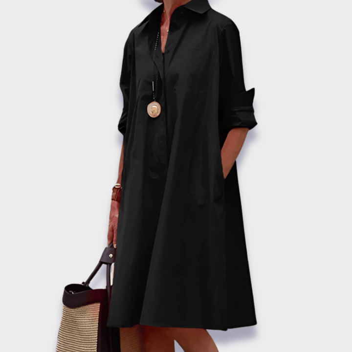 Versatile black women's midi polo dress with classic collar, perfect for comfortable summer and casual style.