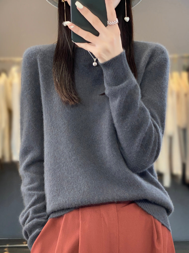 Soft knit women's round neck pullover sweater, long sleeve, ideal casual chic winter apparel.