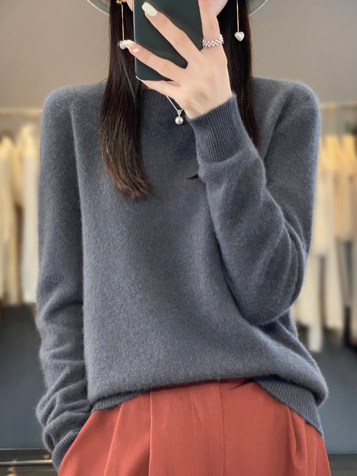Soft knit women's round neck pullover sweater, long sleeve, ideal casual chic winter apparel.