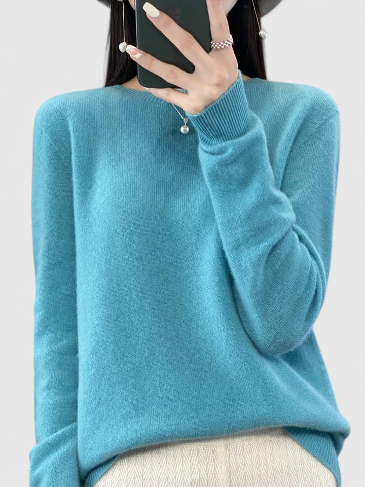 Women's round neck pullover sweater, long sleeve, cozy knit, a classic versatile winter top.