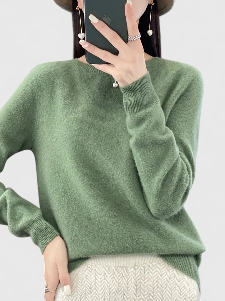 Classic women's long sleeve round neck pullover sweater, cozy knit for versatile wear.