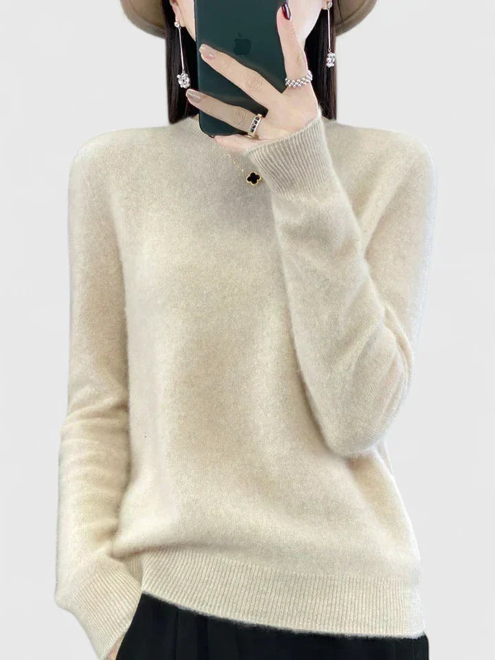 Warm women's classic round neck pullover, cozy knit, versatile long sleeve everyday sweater.