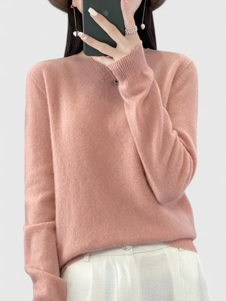 Cozy women's round neck pullover sweater, classic style, long sleeve, perfect for casual wear.