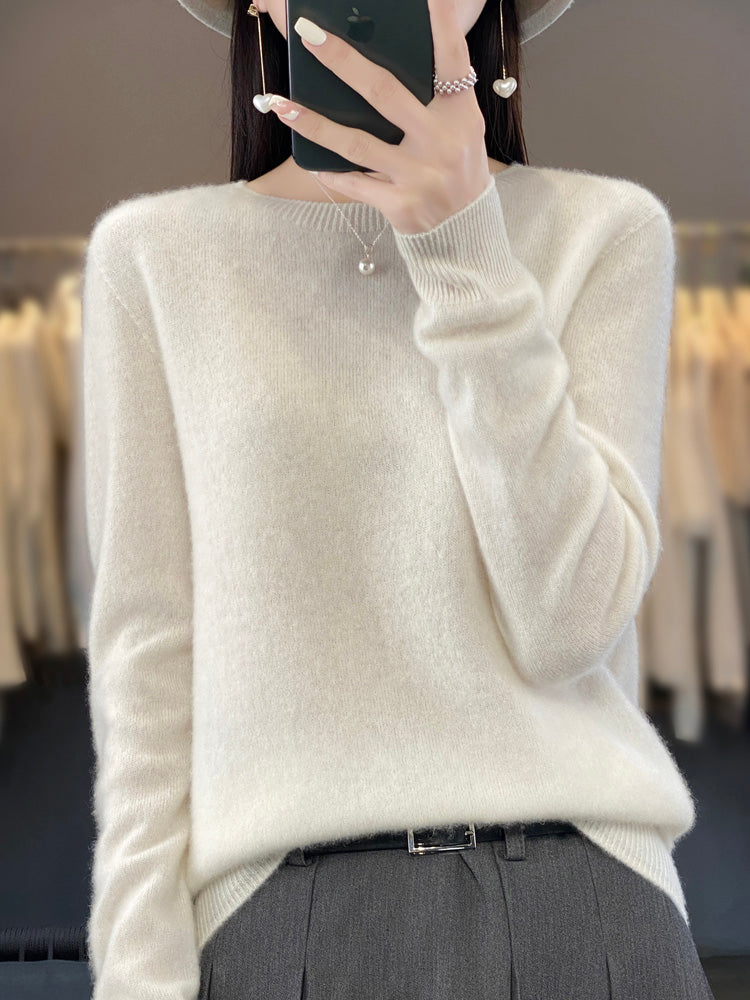 Chic women's round neck pullover, cozy knit, versatile long sleeve sweater for casual fashion.