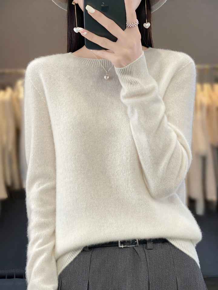 Chic women's round neck pullover, cozy knit, versatile long sleeve sweater for casual fashion.