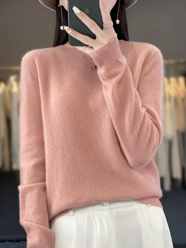 Women's classic round neck pullover sweater, soft knit, long sleeve, versatile for casual chic style.