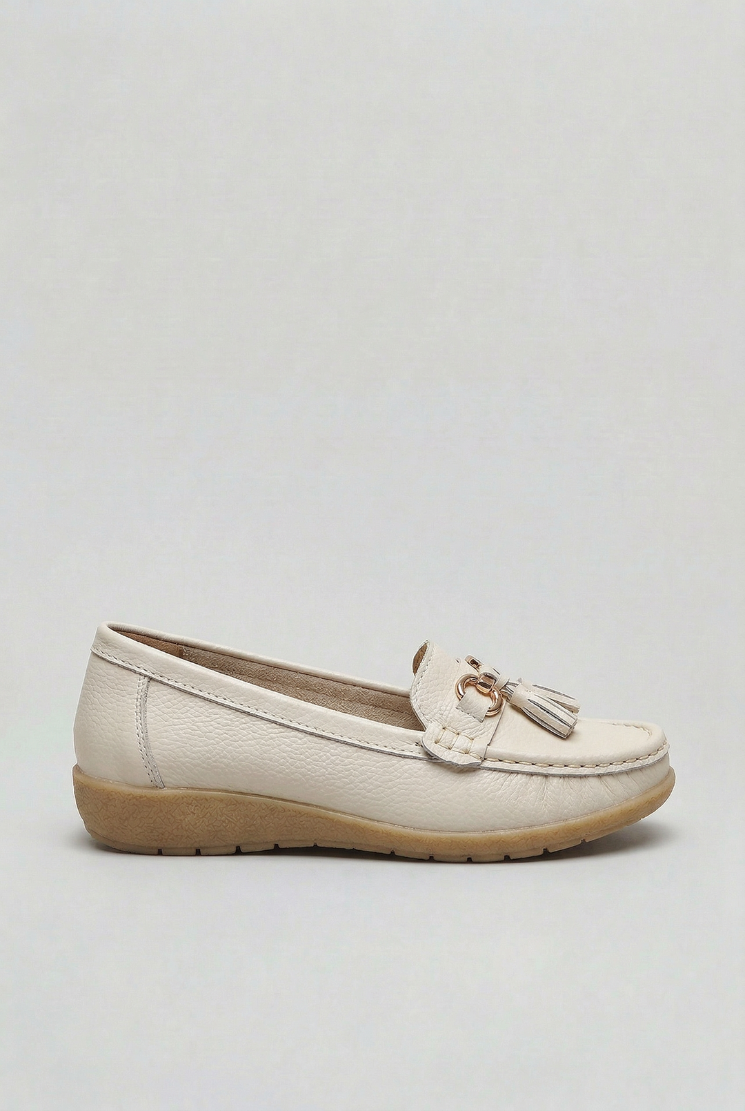 Soft-cushioned women's slip-on loafers, classic everyday design, comfortable casual footwear.