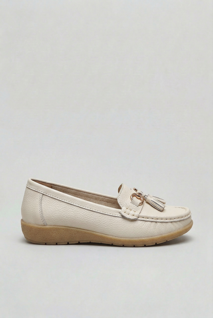 Soft-cushioned women's slip-on loafers, classic everyday design, comfortable casual footwear.