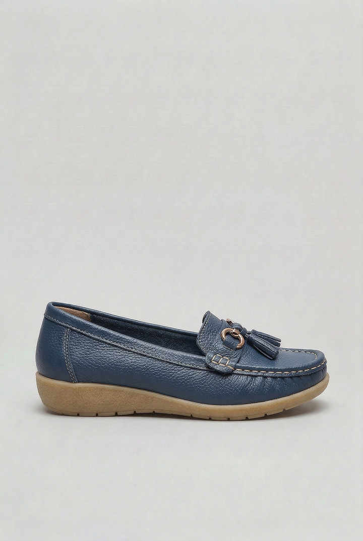 Classic women's slip-on loafers with cushioned sole for comfortable everyday style.