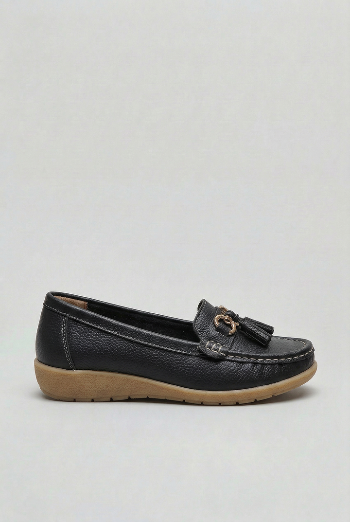 Everyday women's footwear: classic slip-on loafers with cushioned comfort for versatile styling.
