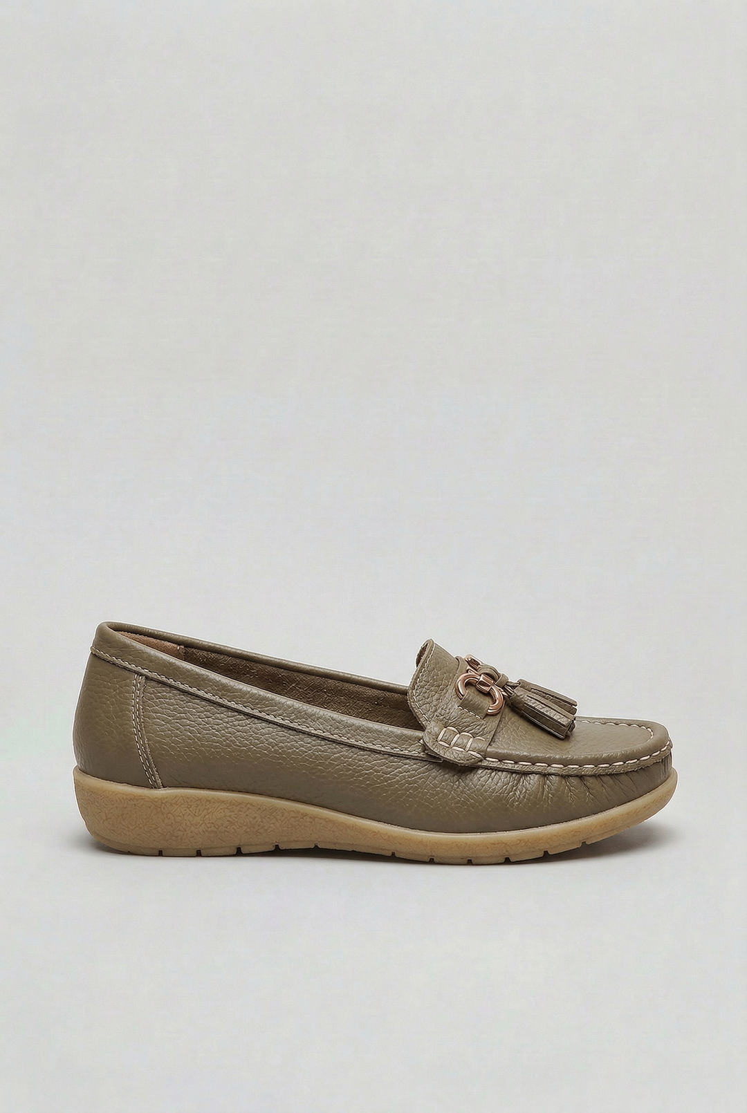 Stylish women's slip-on loafers with a classic design, offering cushioned comfort for casual wear.