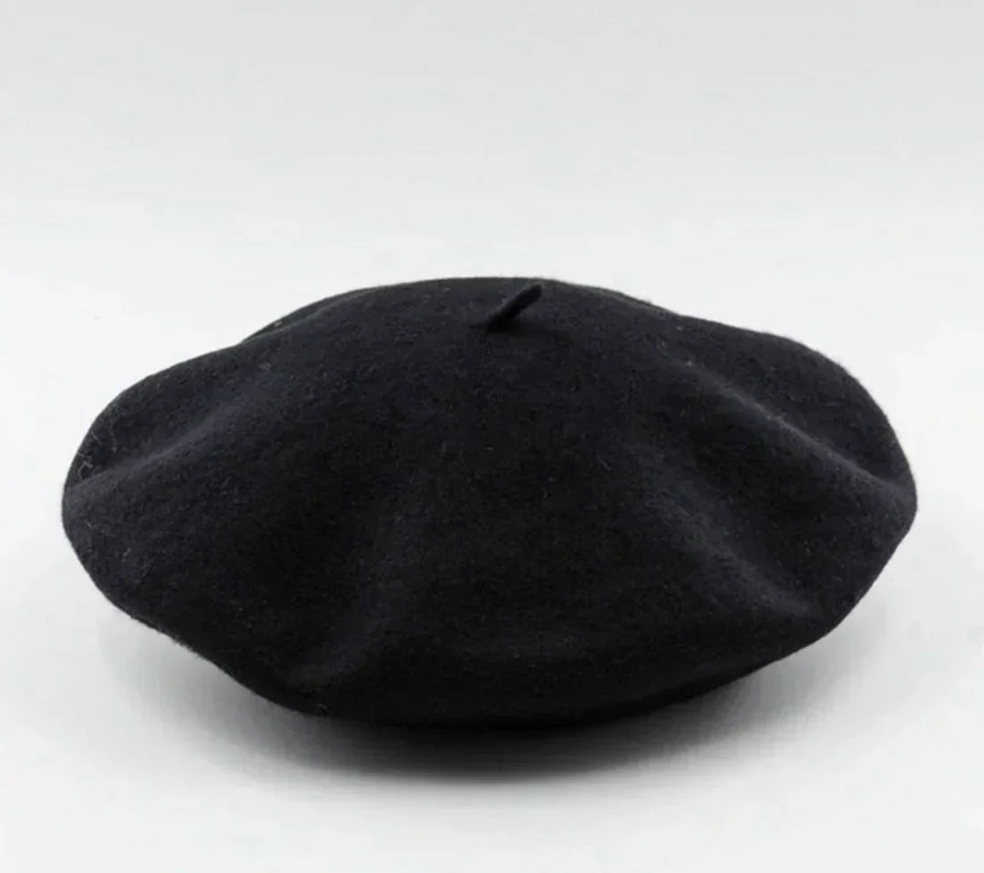 Classic women's soft beret hat, a timeless winter accessory offering warmth and elegant fashion.