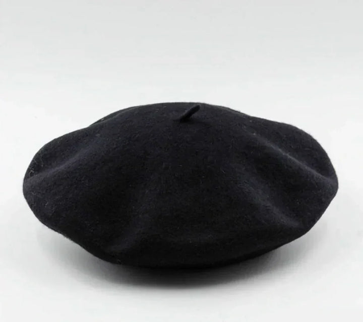 Classic women's soft beret hat, a timeless winter accessory offering warmth and elegant fashion.