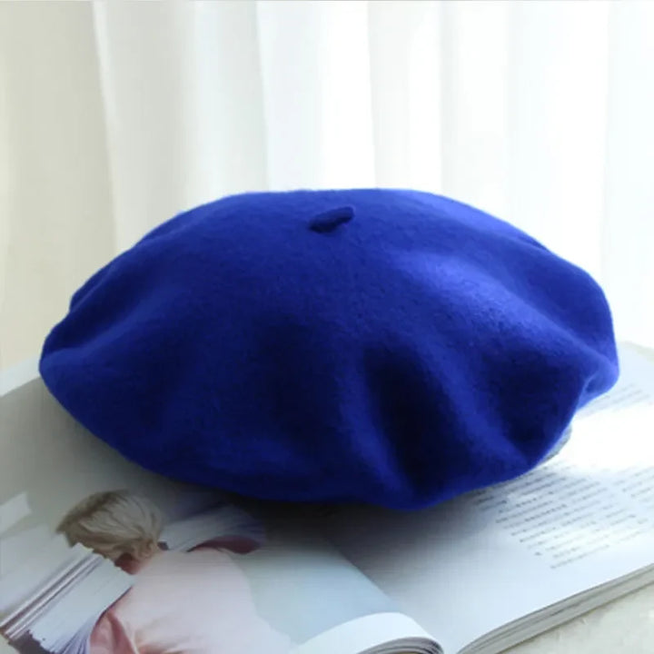 Chic women's classic beret hat, a stylish winter accessory adding elegance to any cold-weather outfit.