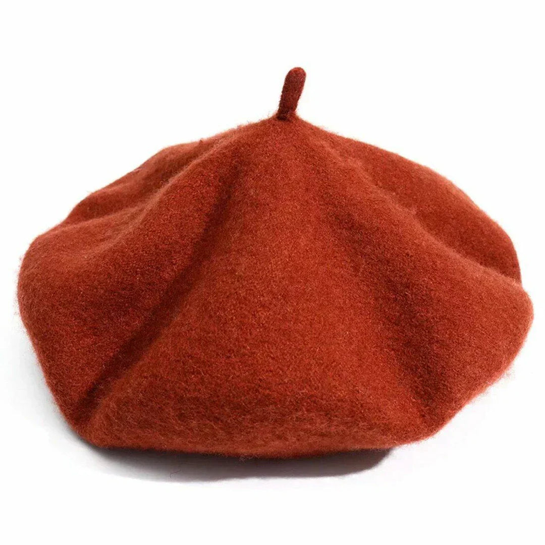 Elegant women's soft beret hat in a classic design, perfect warm winter headwear accessory.