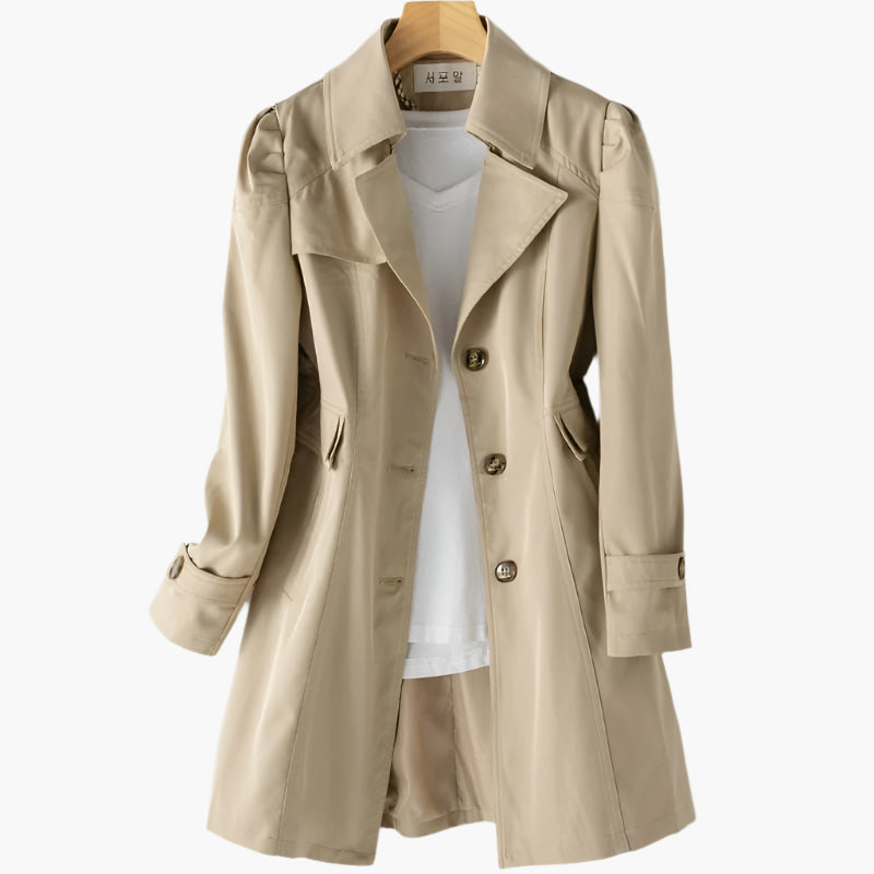 Classic women's trench coat, a versatile outerwear choice providing an elegant tailored fit for any occasion.