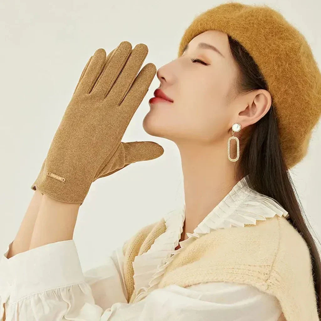 Fashionable ladies' warm touchscreen gloves, a chic accessory for cold weather & smartphone control.
