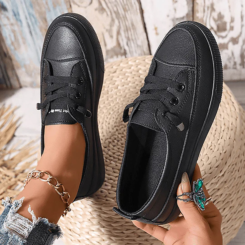 Comfortable women's beige flatform sneakers with classic lace-up design. Stylish casual fashion footwear.