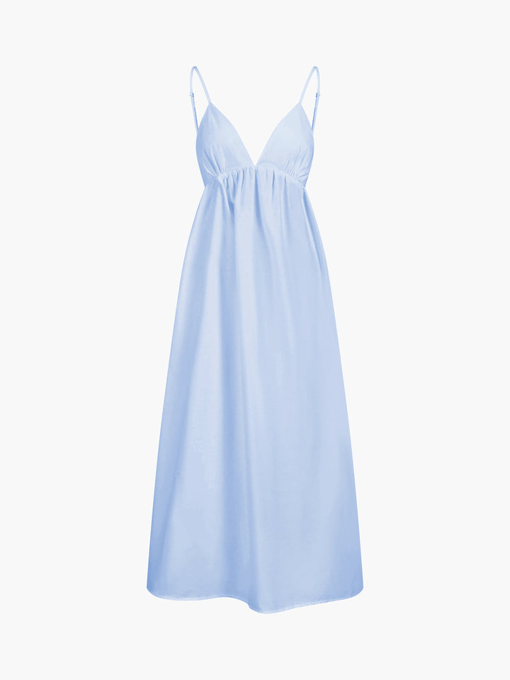 Women's sleeveless V-neck Coastal Cowgirl flowy maxi dress with open back. Ideal for summer casual beachwear.