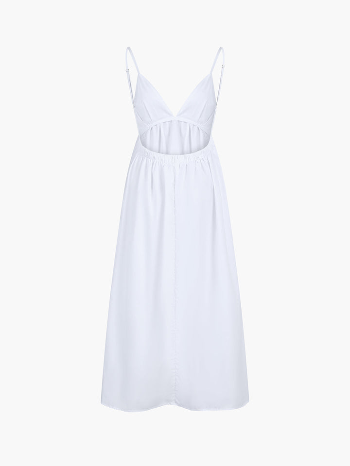 Yellow women's open back flowy maxi dress, Coastal Cowgirl style. A cheerful summer beach vacation outfit.