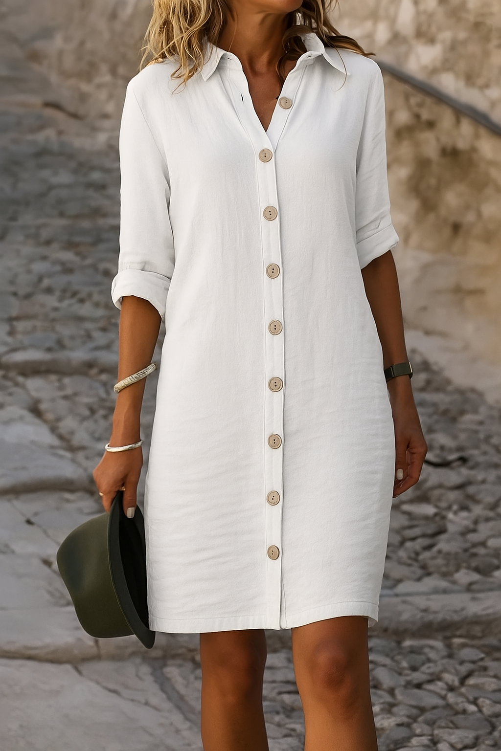 Comfortable women's button-front dress, roll-tab sleeves, perfect knee-length for casual summer.