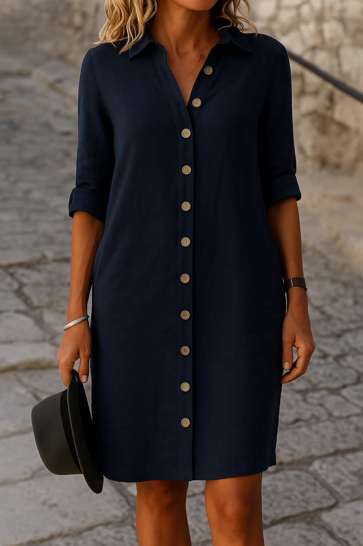Everyday women's shirt dress, button-front, collared, roll-tab sleeves, perfect for stylish comfort.