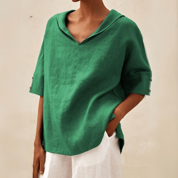 Women's collared V-neck tunic top, relaxed fit, perfect for casual everyday wear.