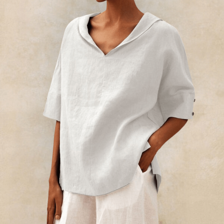 Women's V-neck collared tunic top, long and relaxed fit for versatile, comfortable everyday style.