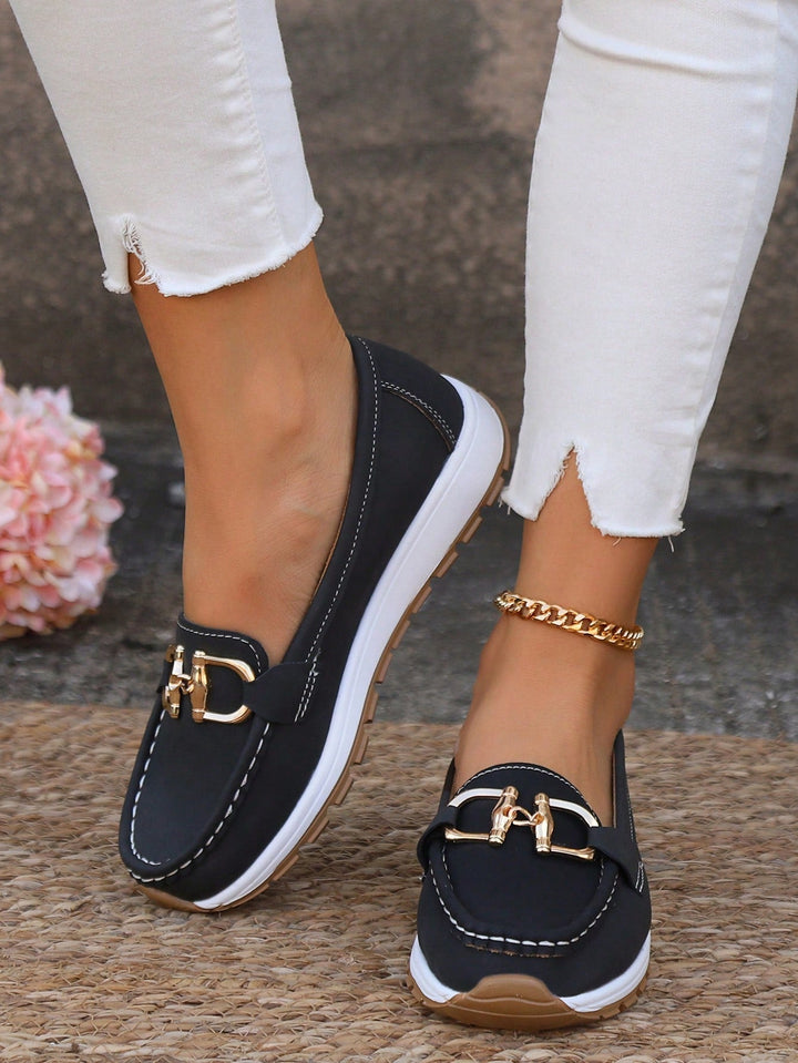 Comfortable women's flat loafers with a chic gold buckle, suitable for daily wear & versatile styling.