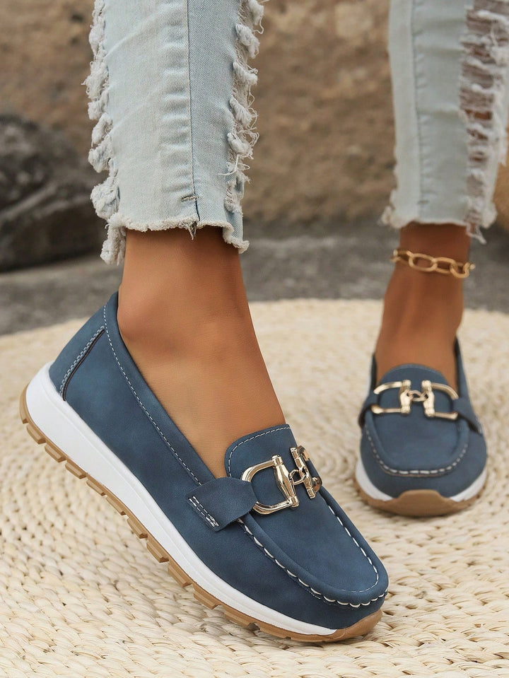 Fashionable women's comfort loafers with a distinctive gold buckle, great for casual & office wear.