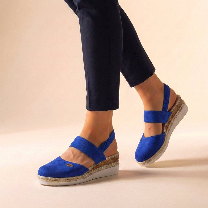 Women's comfort platform espadrille sandals with easy slip-on design & wide straps, great for summer fashion.